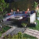 Setting up a Fire Pitt with lanterns ans scented candles